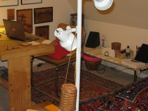 The small table still houses important items but isn't nearly so cluttered.